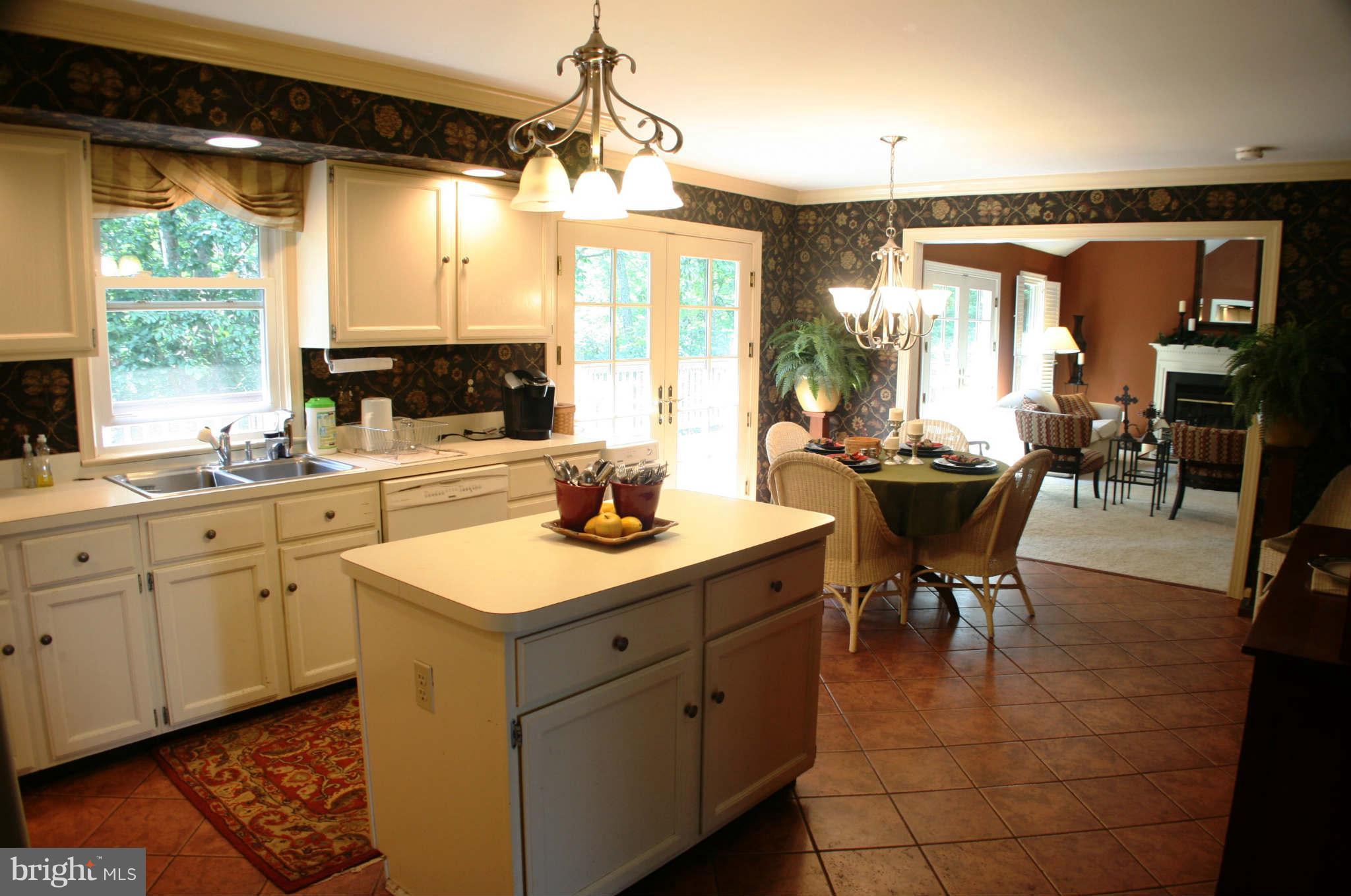 5900 Free State Road Marshall, VA 20115 - Photo 9 of 30 a kitchen with a sink stove and cabinets