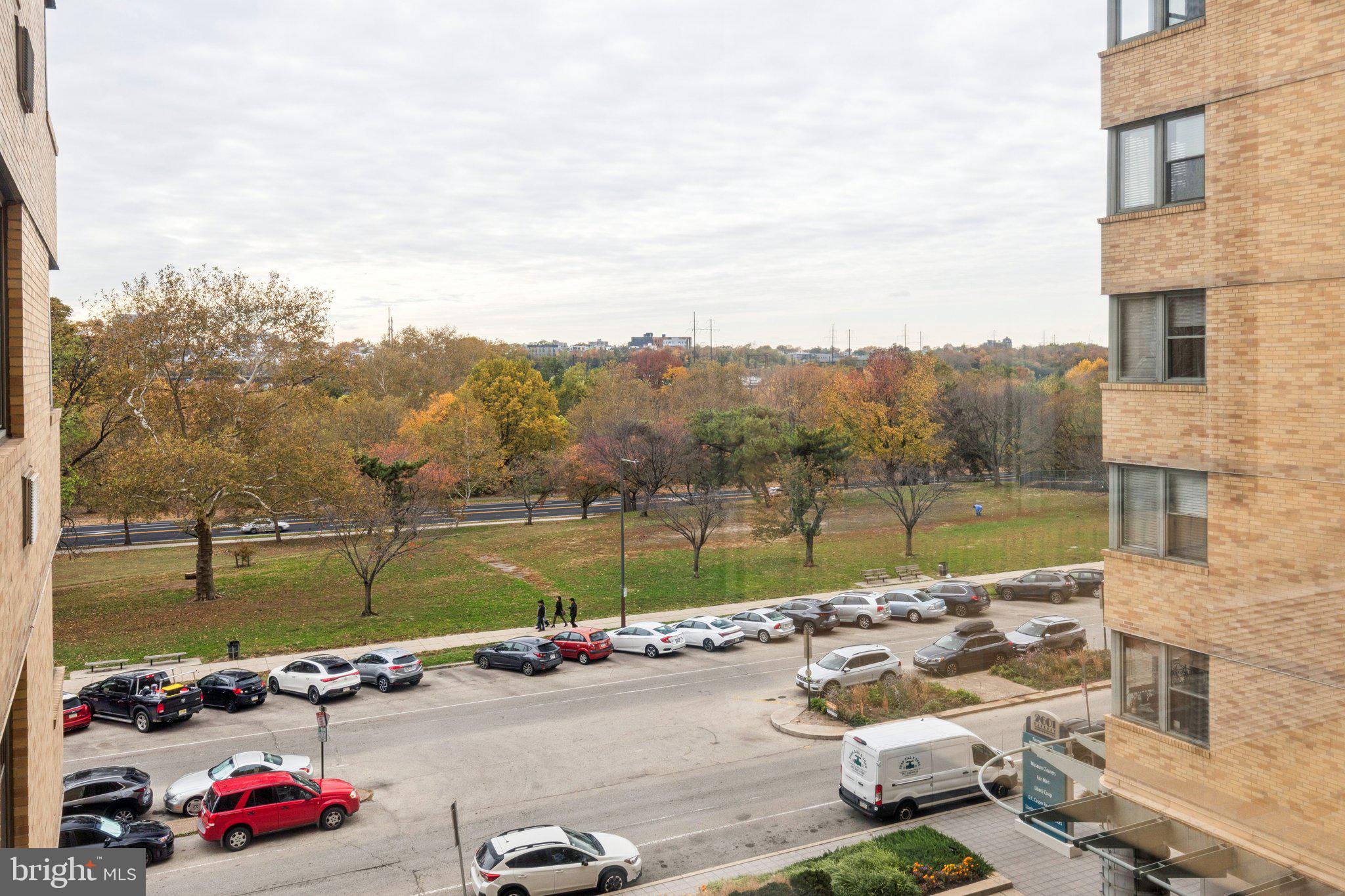 2601 Pennsylvania Avenue, Unit 449 Philadelphia, PA 19130 - Photo 16 of 18 a view of a lake with couches and city view