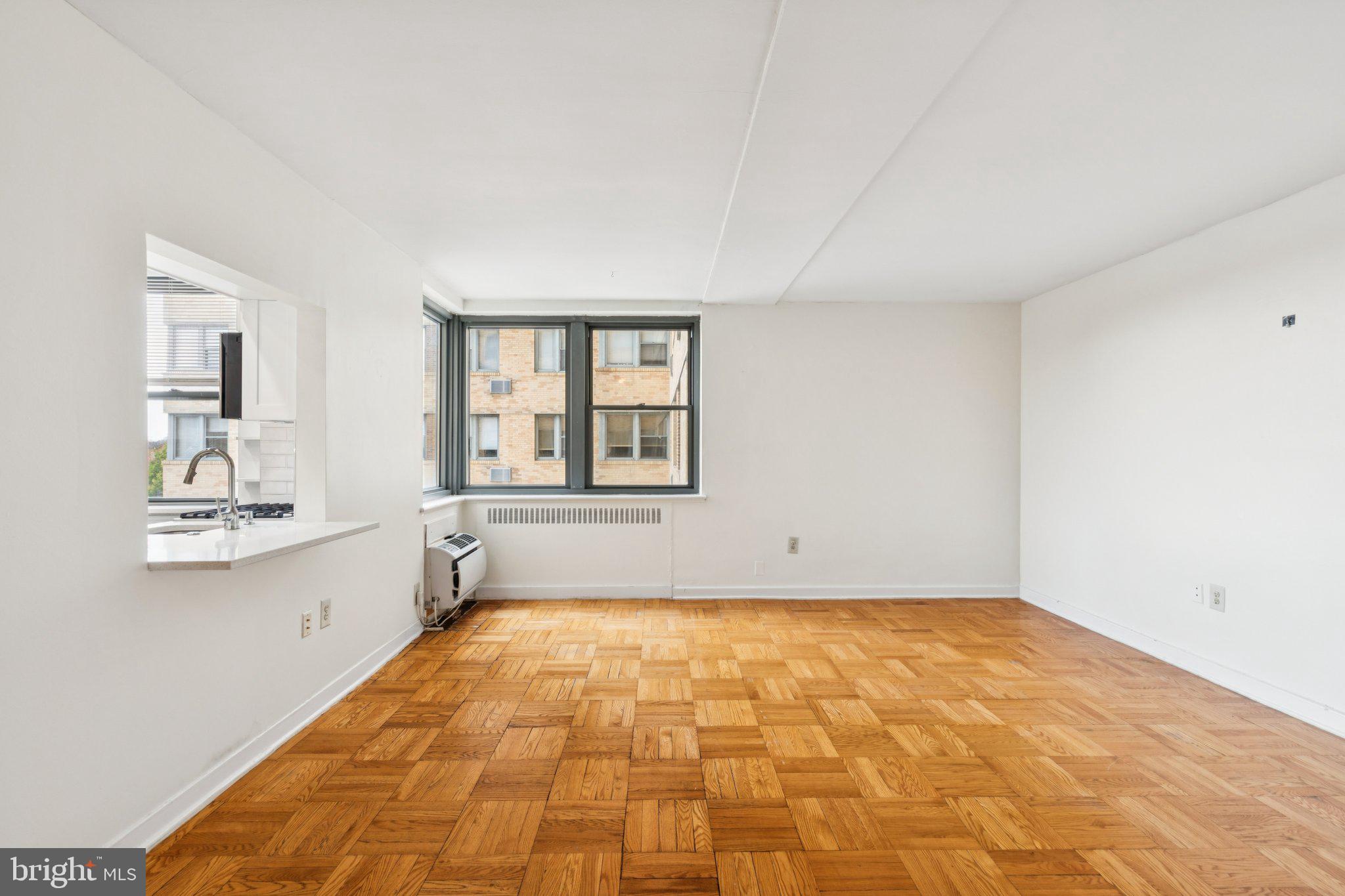 2601 Pennsylvania Avenue, Unit 449 Philadelphia, PA 19130 - Photo 5 of 18 a view of an empty room with a window
