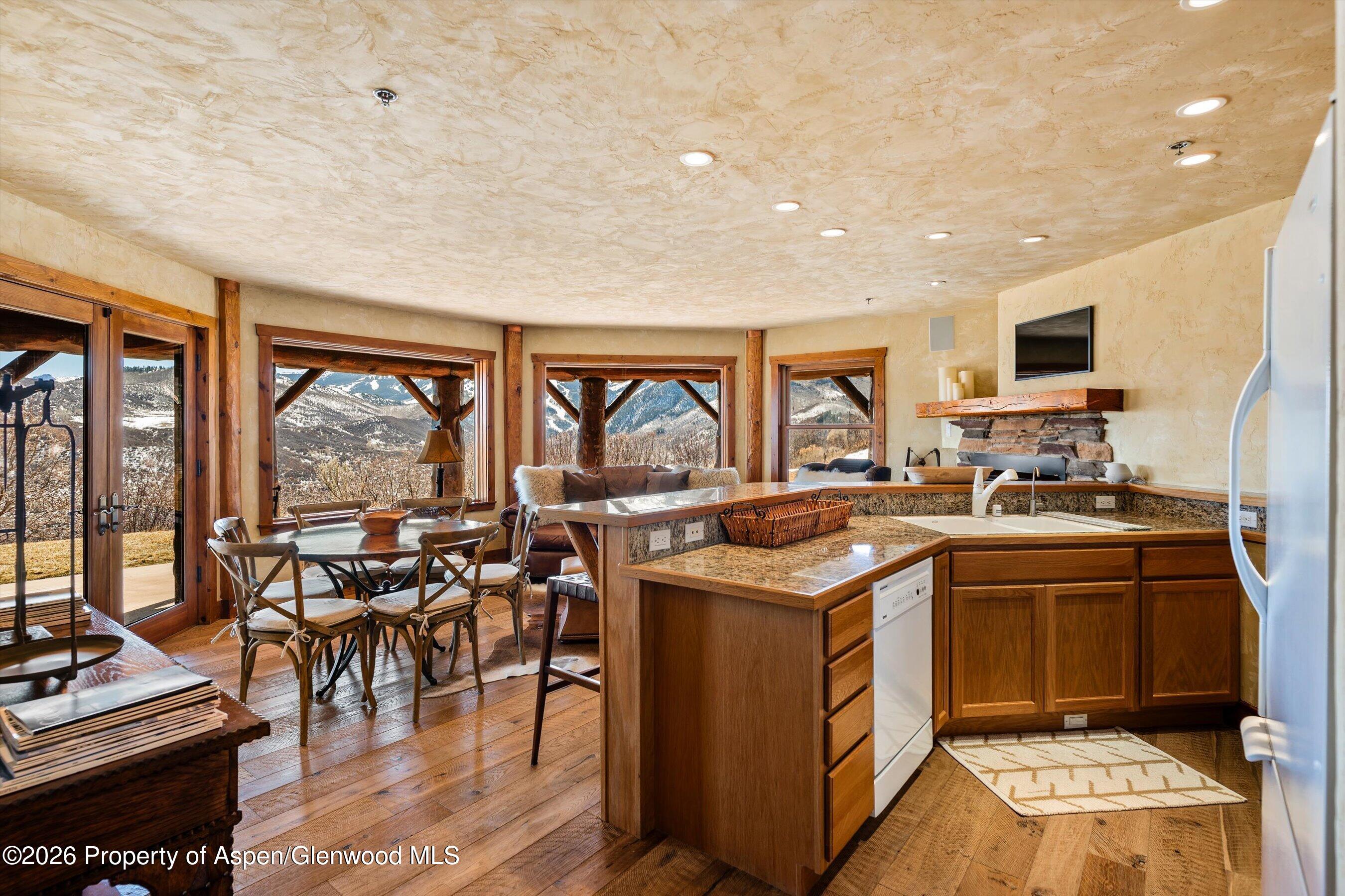 1450 Mesa Road Snowmass, CO 81654 - Photo 28 of 49 11ApartmentKitchenLivingArea