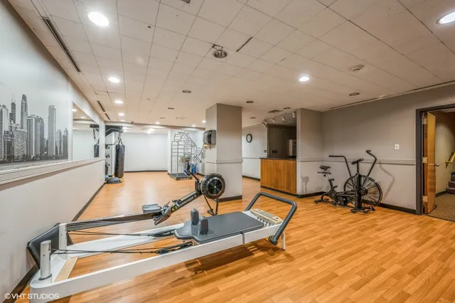 a view of a balcony with wooden floor
