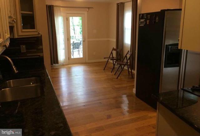 4128 Sampson Road Silver Spring, MD 20906 - Photo 12 of 30 Dining Rm Sliding Glass Doors to Large Railed Deck