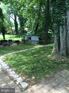 4128 Sampson Road Silver Spring, MD 20906 - Photo 15 of 30 Terraced Back Yard with Shade Tree by Deck