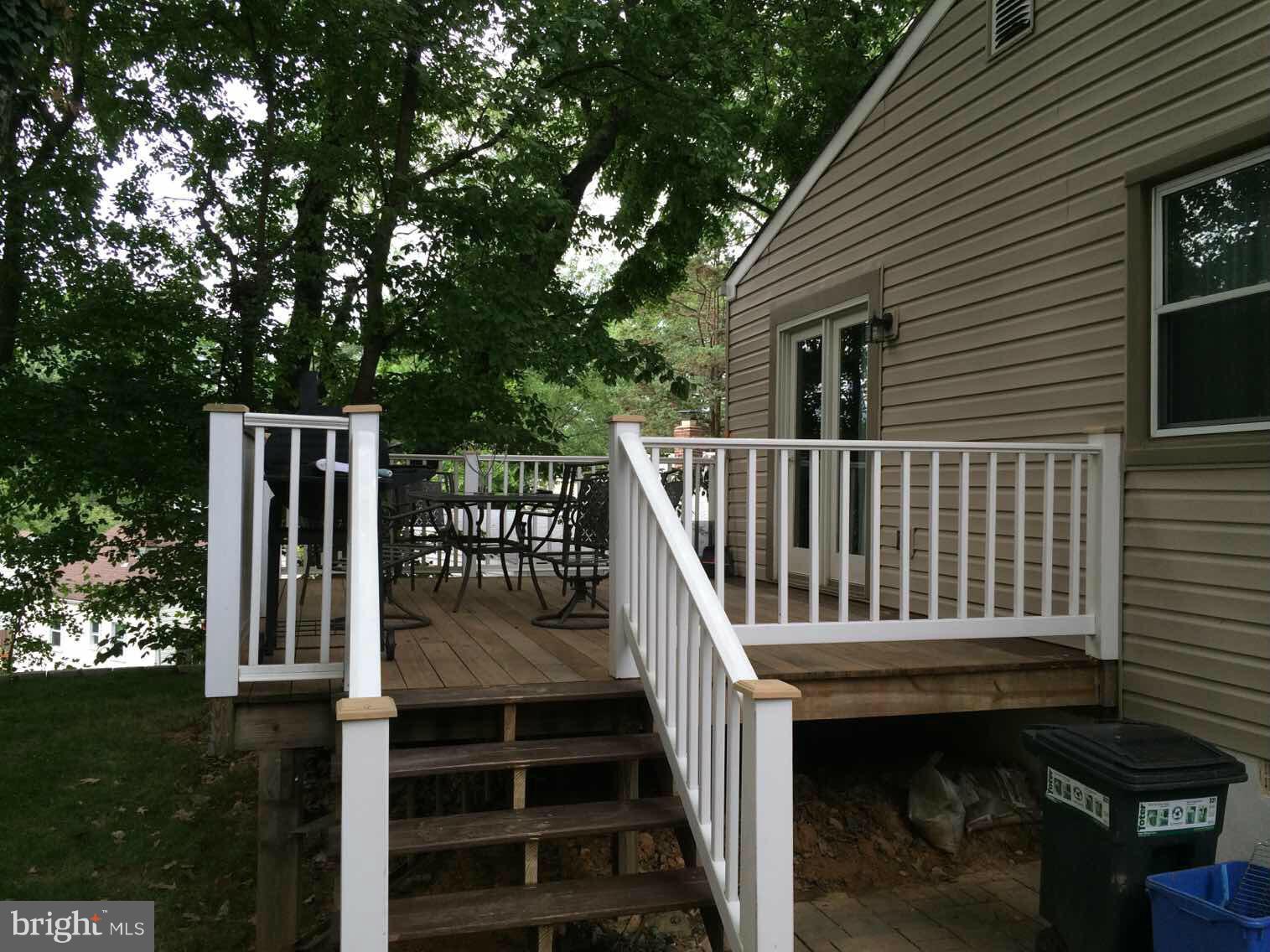 4128 Sampson Road Silver Spring, MD 20906 - Photo 16 of 30 Deck Stairs to Side Patio, Driveway