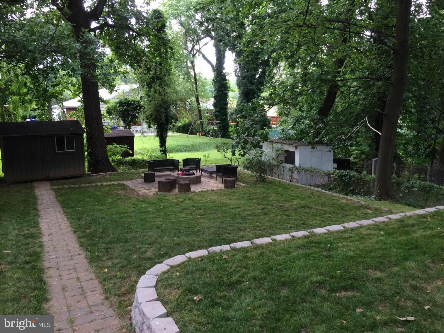 4128 Sampson Road Silver Spring, MD 20906 - Photo 18 of 30 Terraced Backyard with shed and BBQ pit
