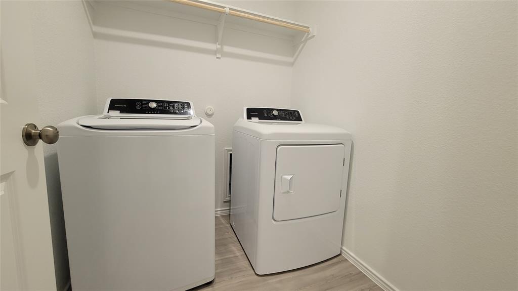 587 Avre Loop Kyle, TX 78640 - Photo 11 of 20 a room with storage and utility