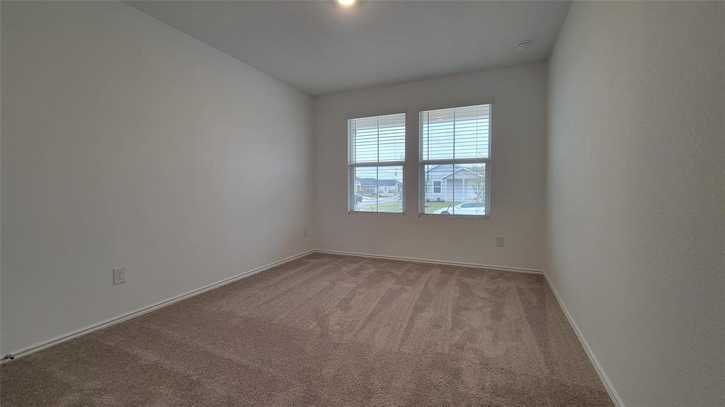 587 Avre Loop Kyle, TX 78640 - Photo 12 of 20 an empty room with a window