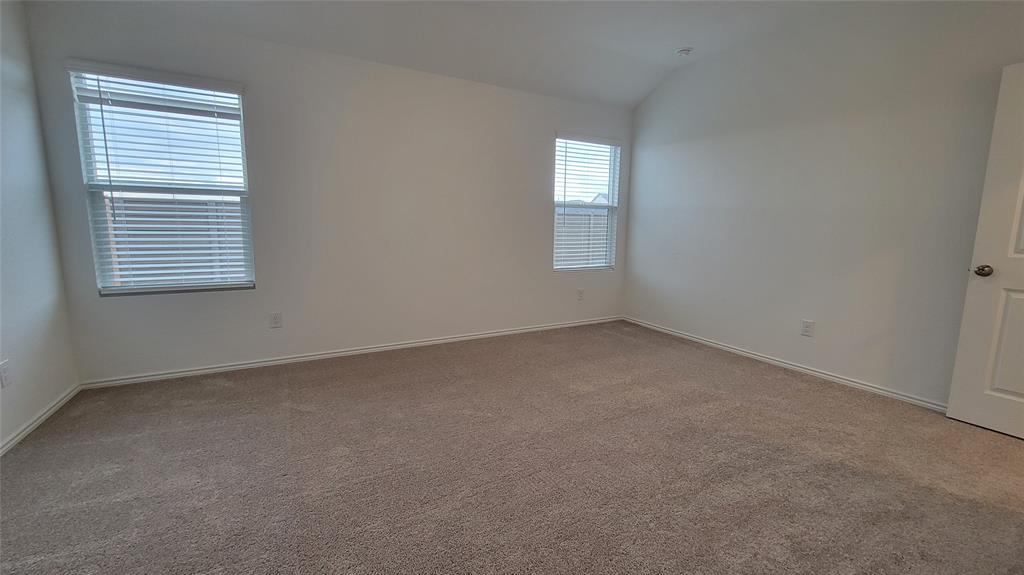 587 Avre Loop Kyle, TX 78640 - Photo 10 of 20 an empty room with a window