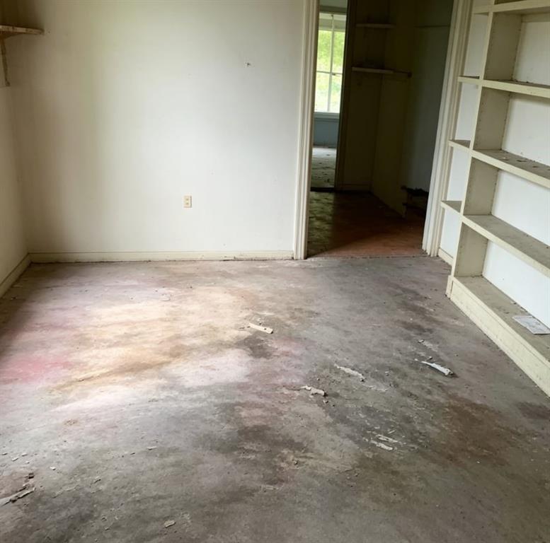 411 Stiles Road Selma, AL 36701 - Photo 7 of 7 a view of an empty room with a window