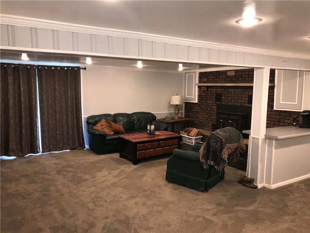 1723 Amity Ridge Road Washington, PA 15301 - Photo 16 of 25 Updated 26x19 game room with woodstove. Sliding door to backyard.