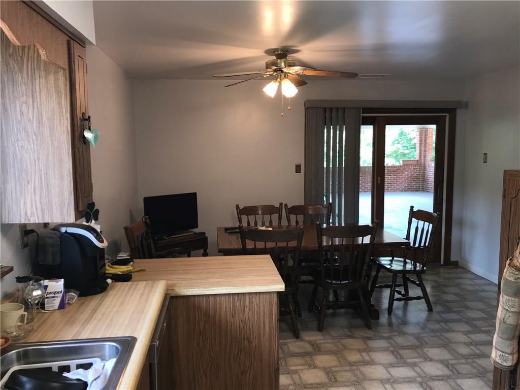 1723 Amity Ridge Road Washington, PA 15301 - Photo 5 of 25 Kitchen open to dining room. Sliding door to patio.