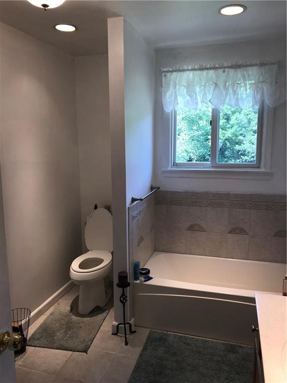 1723 Amity Ridge Road Washington, PA 15301 - Photo 10 of 25 Large main floor bath with ceramic tile and recessed lighting.