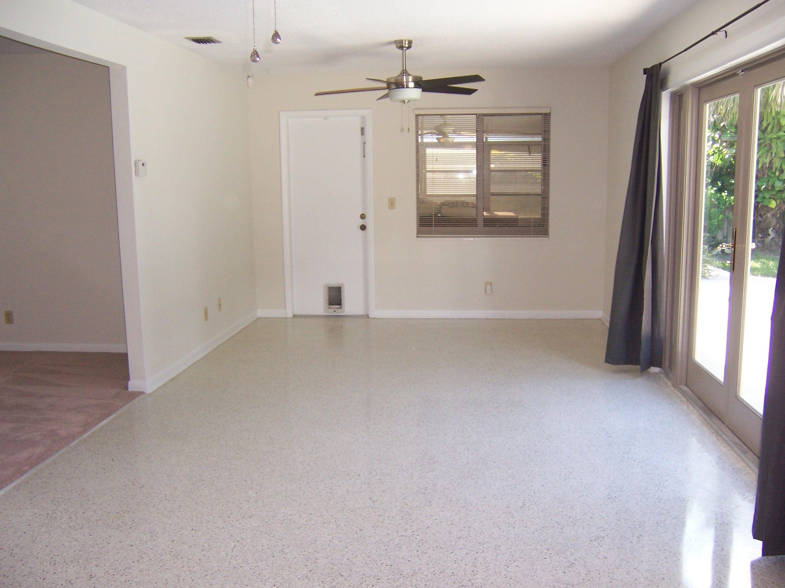 2664 Exuma Road West Palm Beach, FL 33406 - Photo 23 of 33 family room with view towards florida rm