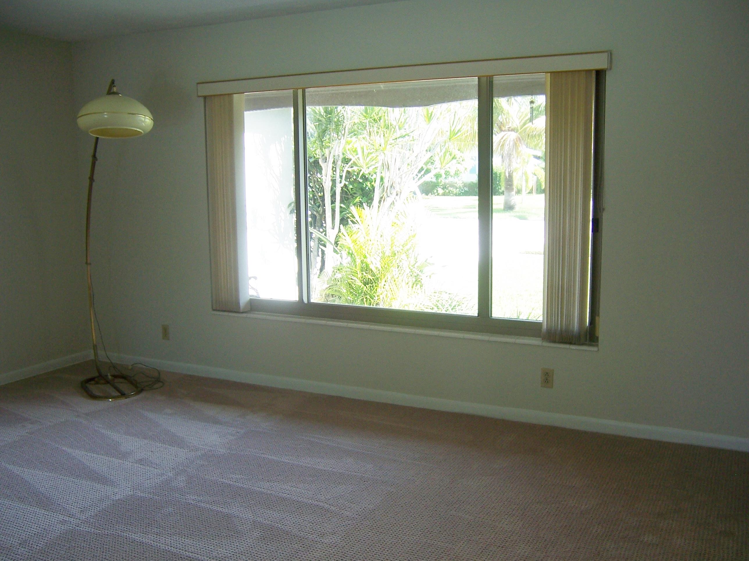 2664 Exuma Road West Palm Beach, FL 33406 - Photo 24 of 33 living room with large picture window