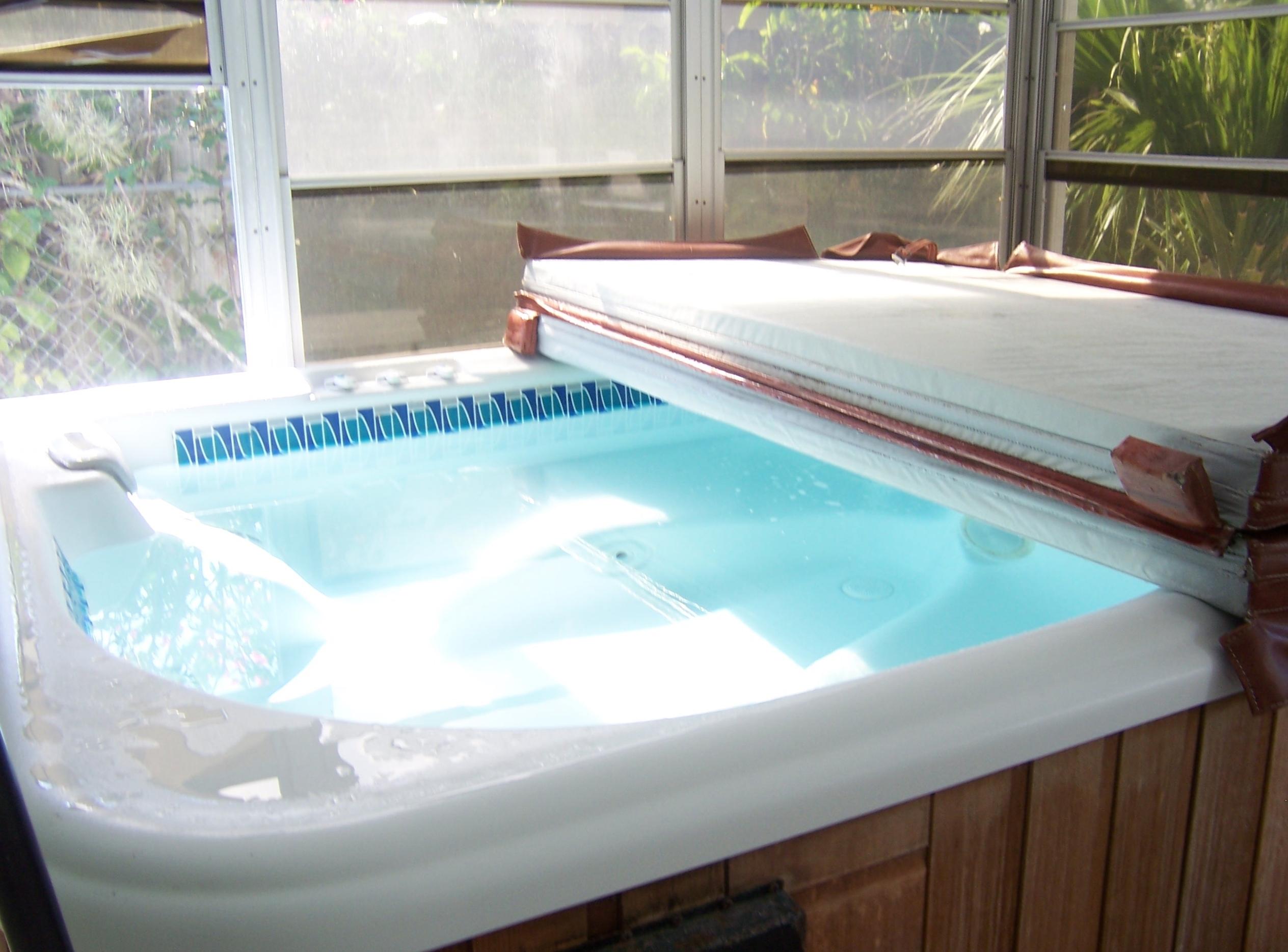 2664 Exuma Road West Palm Beach, FL 33406 - Photo 25 of 33 large hot tub in florida room conveys