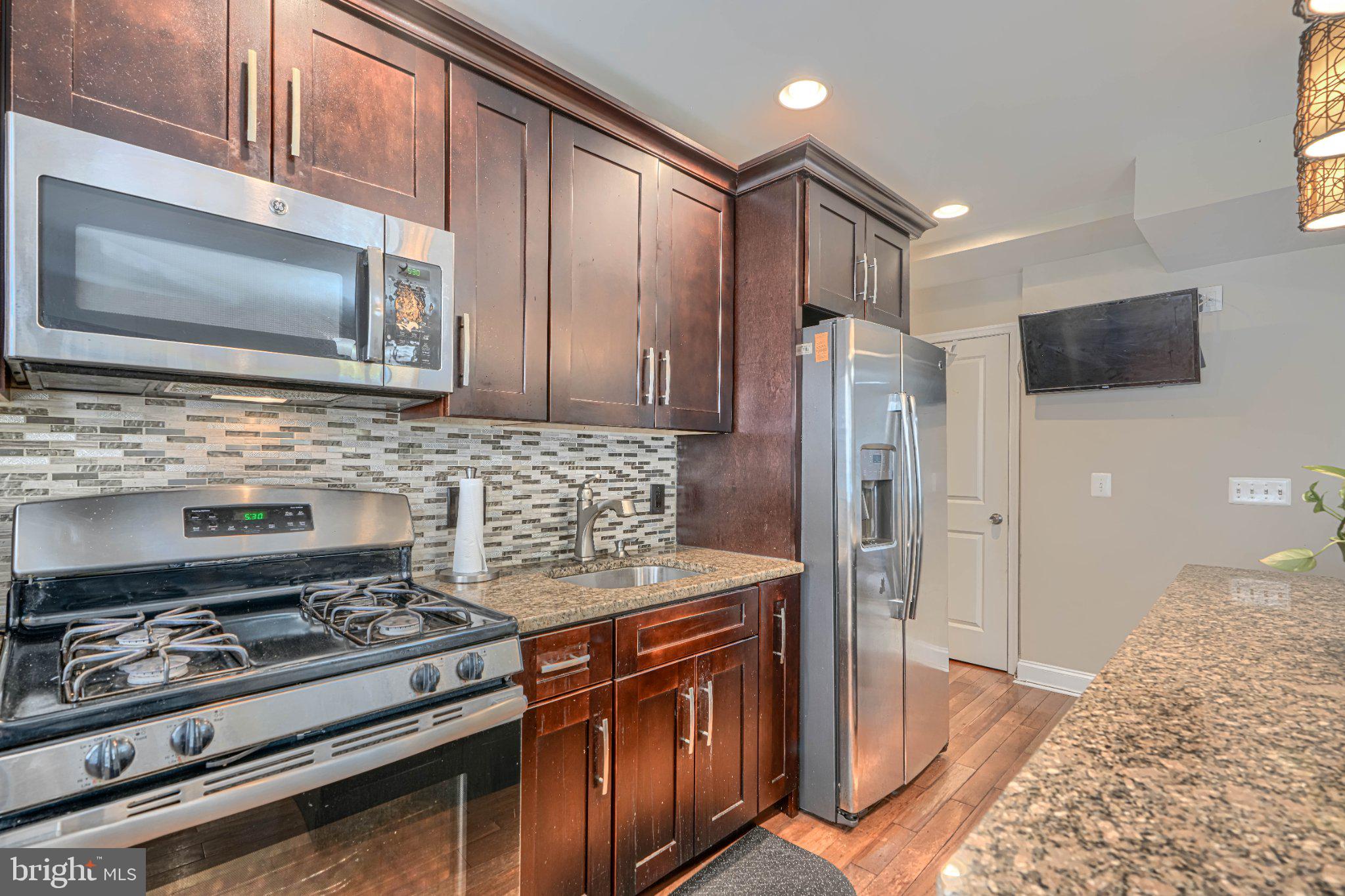 1639 Walterswood Road Baltimore, MD 21239 - Photo 20 of 49 Modern kitchen with sleek finishes.