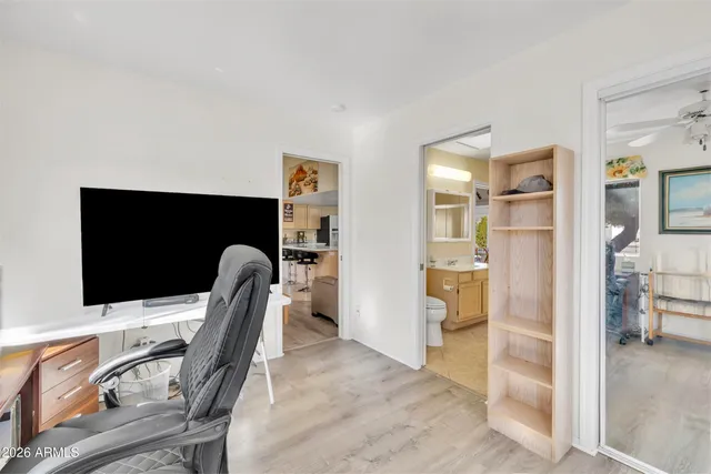 a view of a living room and bathroom
