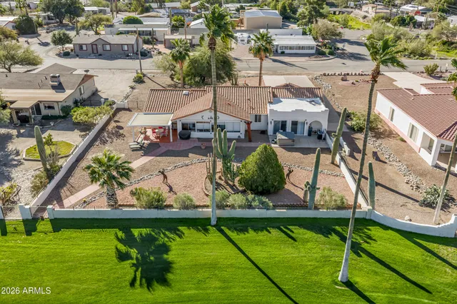 a view of a garden with a lake