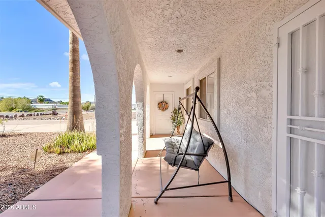 a view of entryway and kitchen