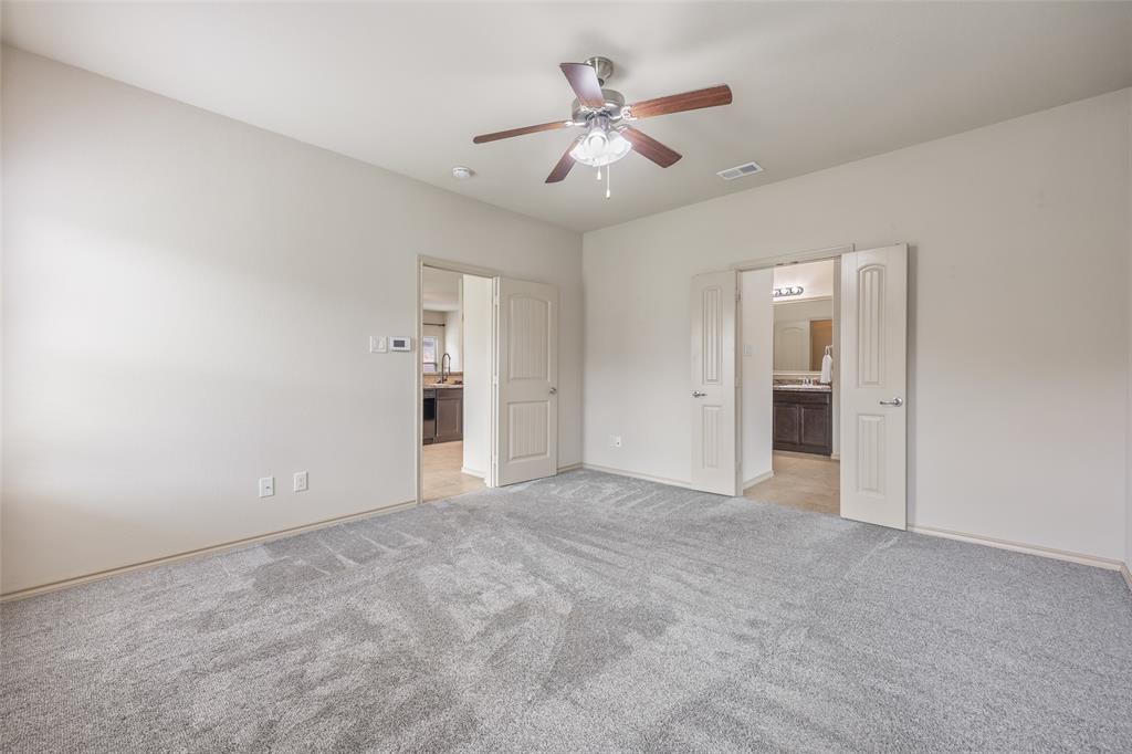 4016 Lazy River Ranch Road Fort Worth, TX 76262 - Photo 18 of 40 Primary bedroom facing ensuite