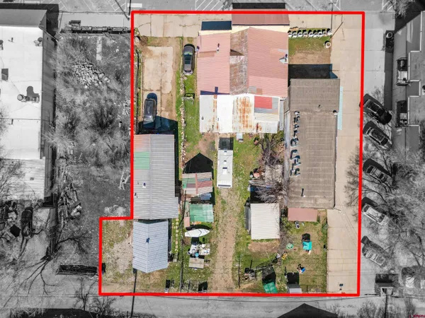 an aerial view of residential building and ocean