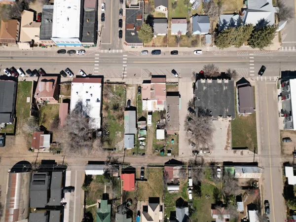 an aerial view of a city with lots of residential buildings