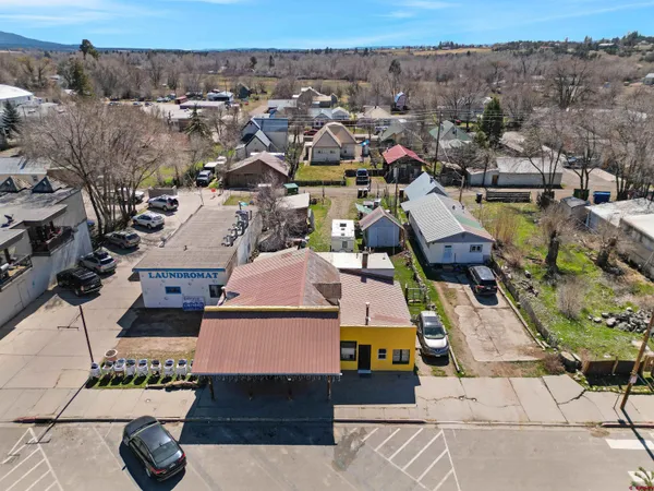 an aerial view of a house with a garden