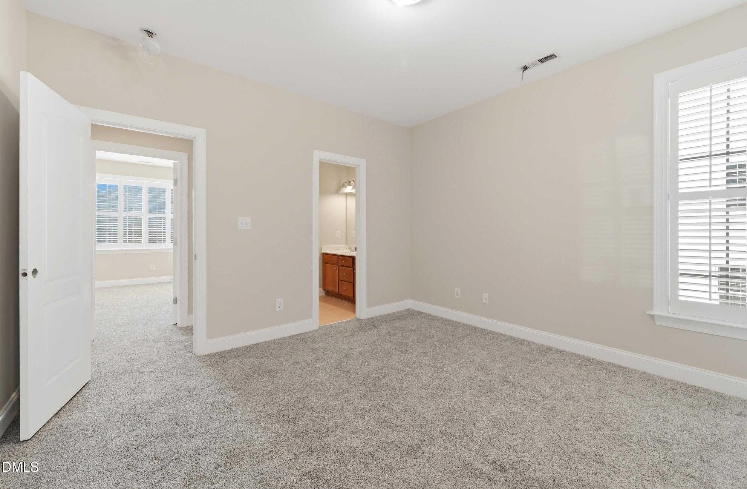 4803 Marena Place Durham, NC 27707 - Photo 29 of 42 an empty room with windows