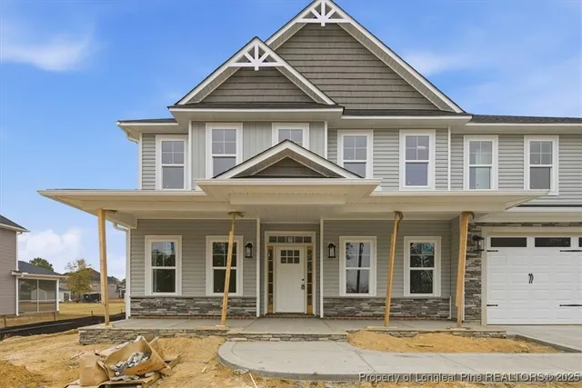 a bathroom with a sink toilet and mirror