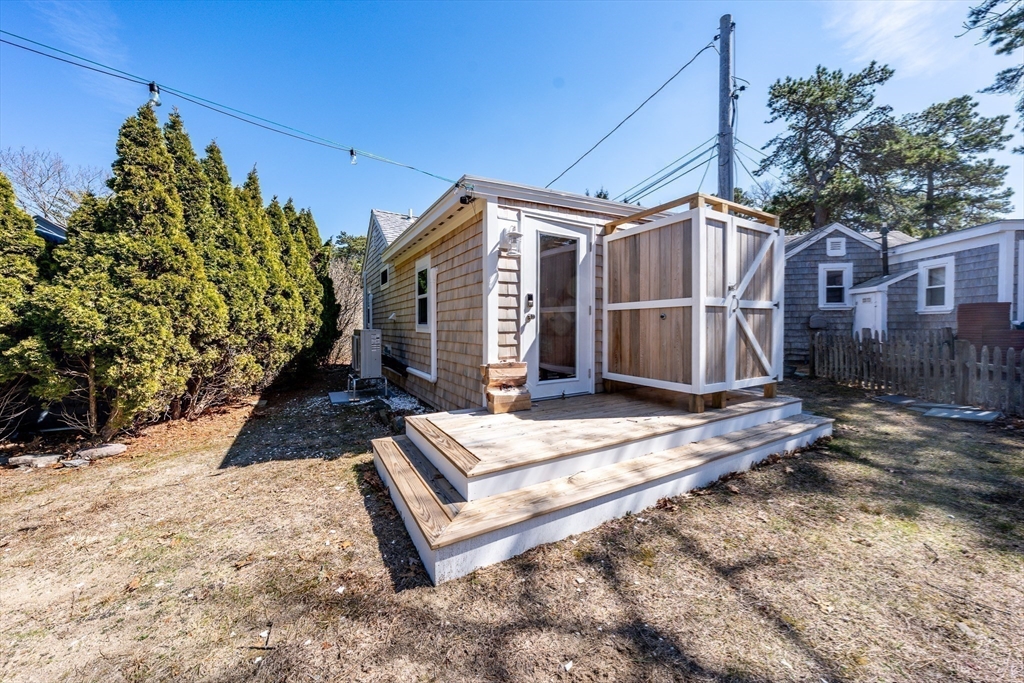 17 Ploughed Neck Road Sandwich, MA 02537 - Photo 11 of 13 a view of backyard with green space