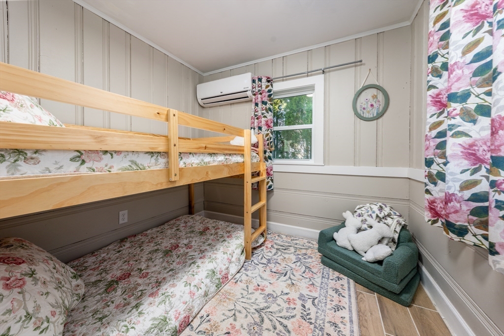 17 Ploughed Neck Road Sandwich, MA 02537 - Photo 10 of 13 a view of a hallway to room with wooden floor