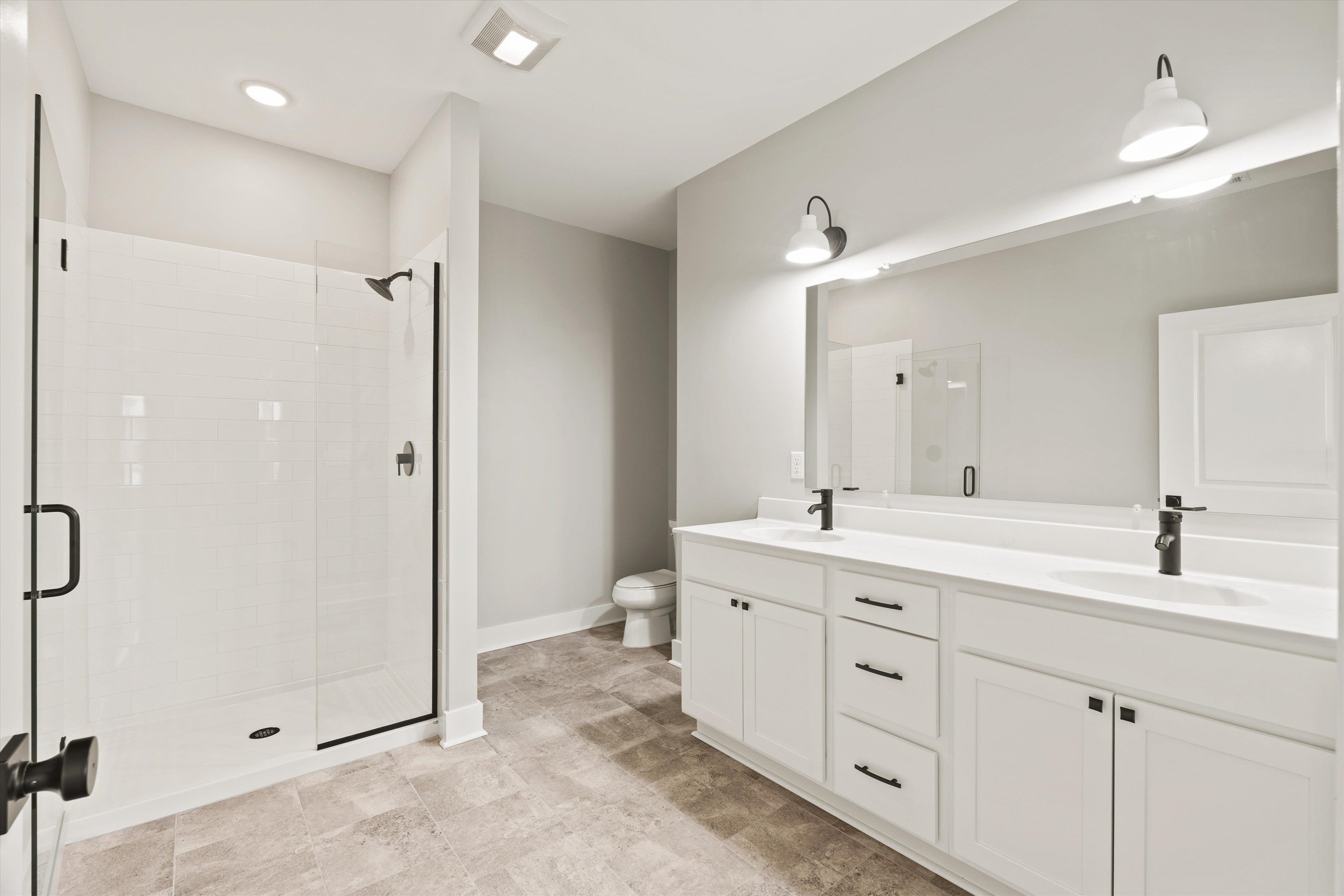25 Barnyard Circle Bridgewater, VA 22812 - Photo 14 of 45 a spacious bathroom with a double vanity sink mirror and shower