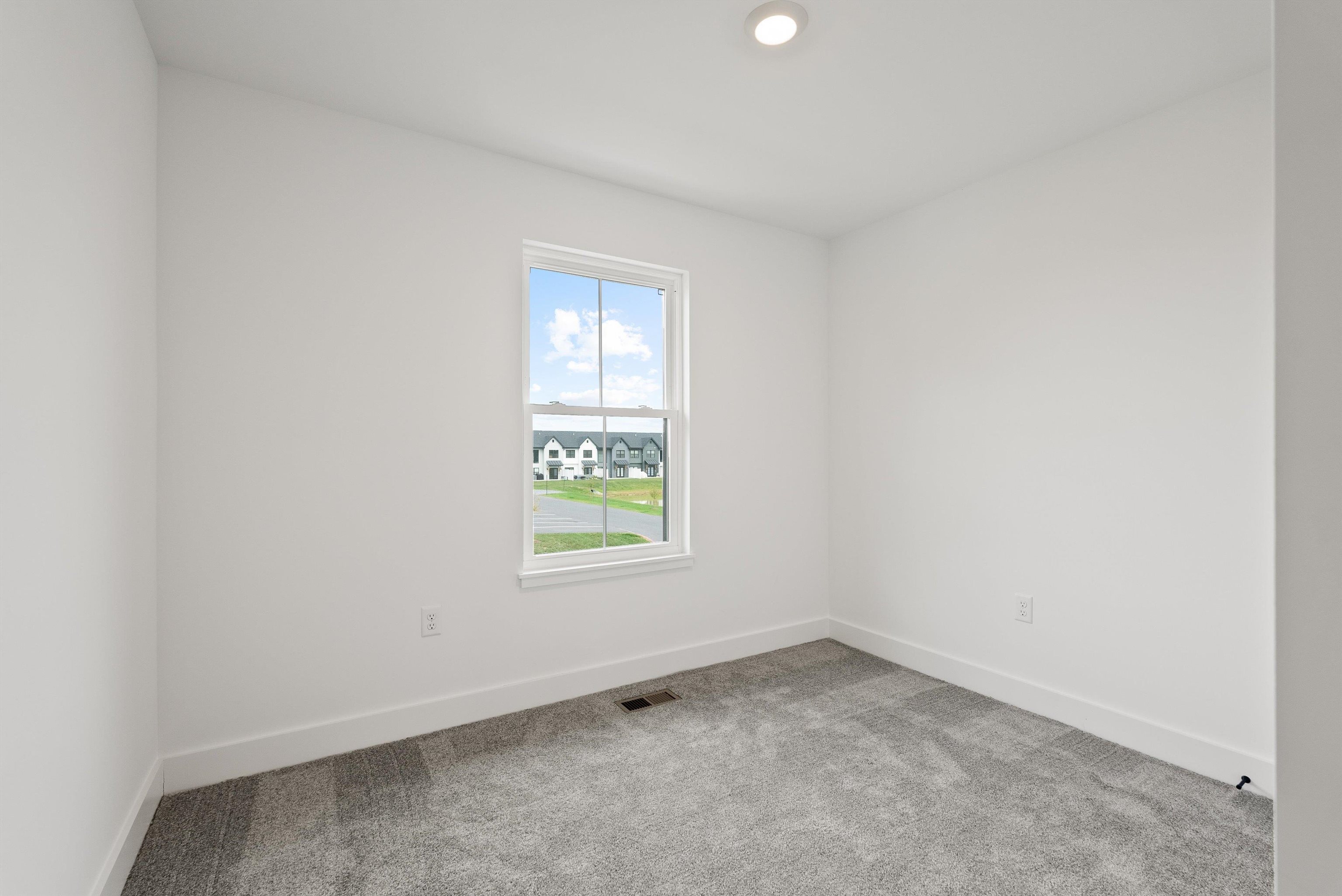 25 Barnyard Circle Bridgewater, VA 22812 - Photo 22 of 45 an empty room with a window