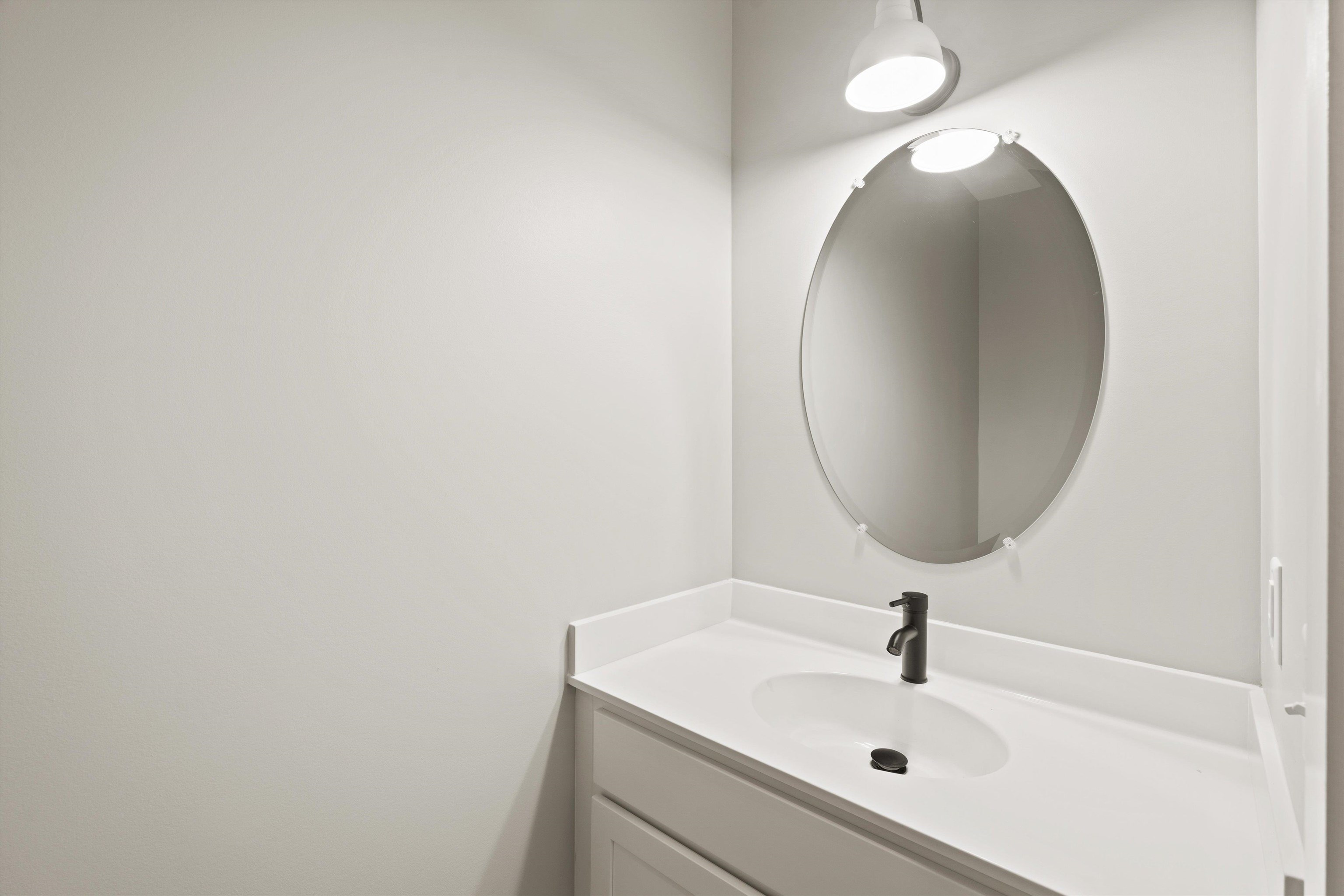 25 Barnyard Circle Bridgewater, VA 22812 - Photo 25 of 45 a bathroom with a sink and mirror