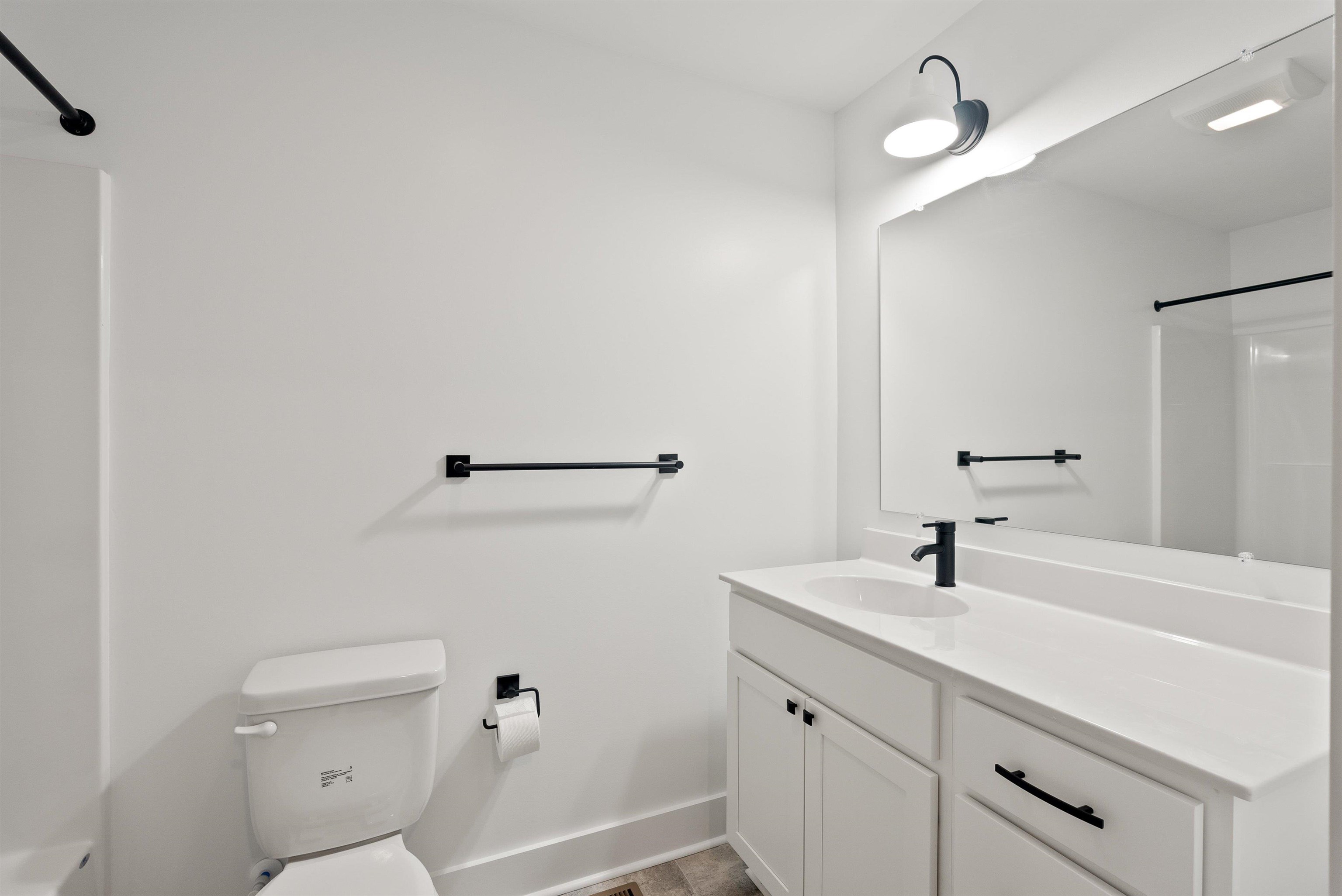 25 Barnyard Circle Bridgewater, VA 22812 - Photo 33 of 45 a bathroom with a sink a toilet and shower