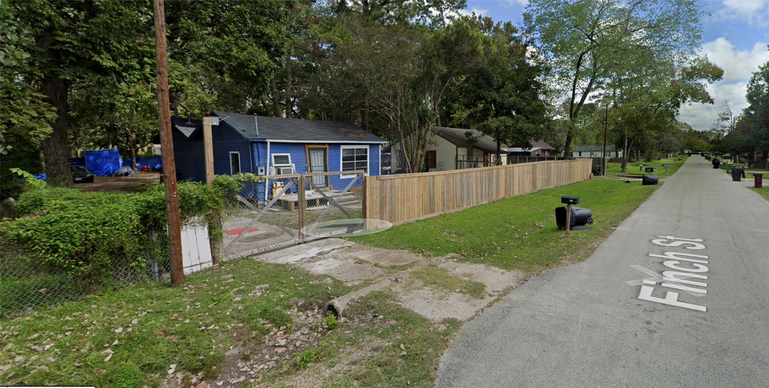 6911 Finch Street Houston, TX 77028 - Photo 2 of 9 a view of a chairs in a backyard