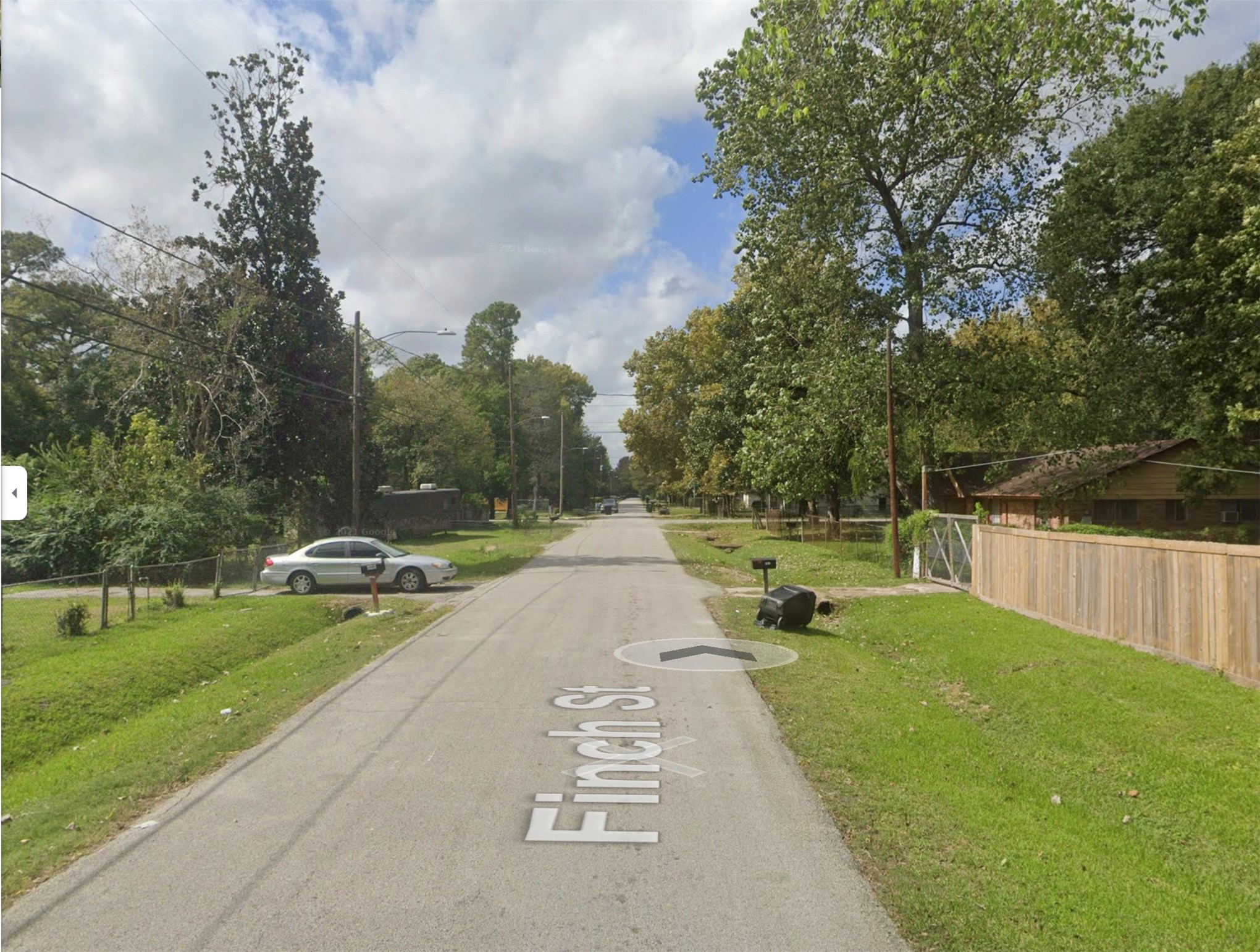 6911 Finch Street Houston, TX 77028 - Photo 3 of 9 a view of park with large trees