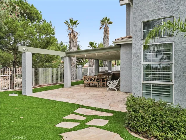 a view of a porch with a yard