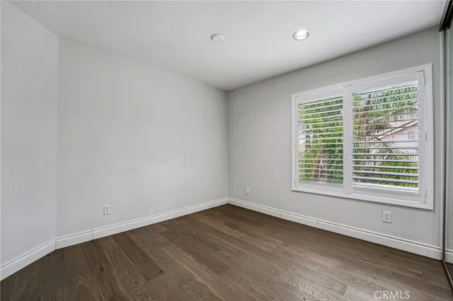 a bathroom with a sink double vanity granite tub and shower