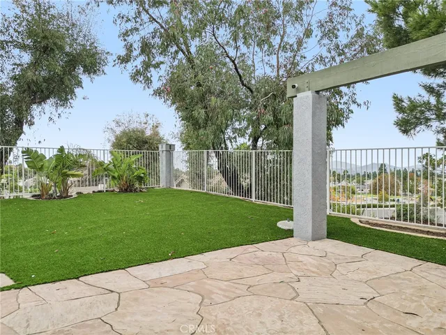 a view of a backyard with garden