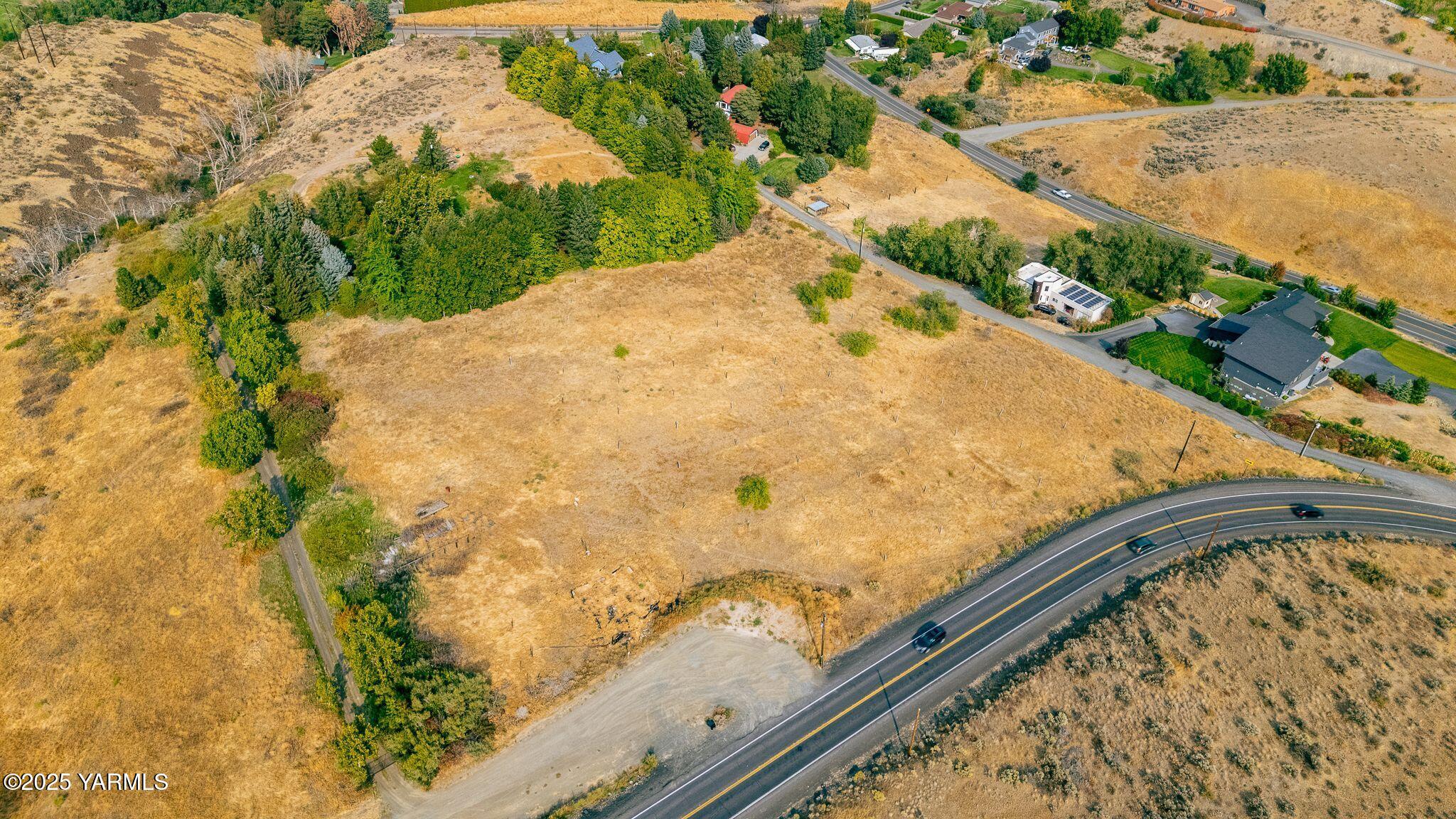 a view of a backyard of a house