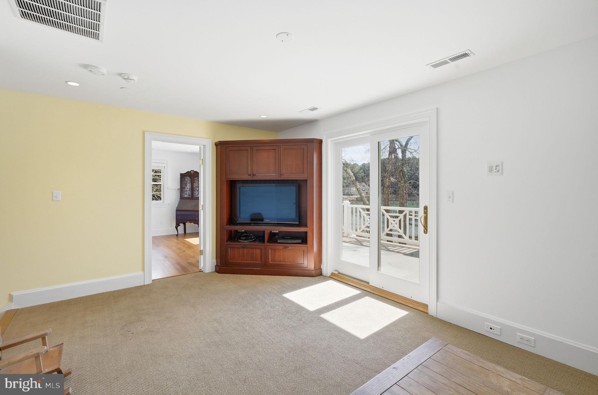 4573 Bringman Farm Road Oxford, MD 21654 - Photo 36 of 61 2nd Level Sitting Area - Balcony Access