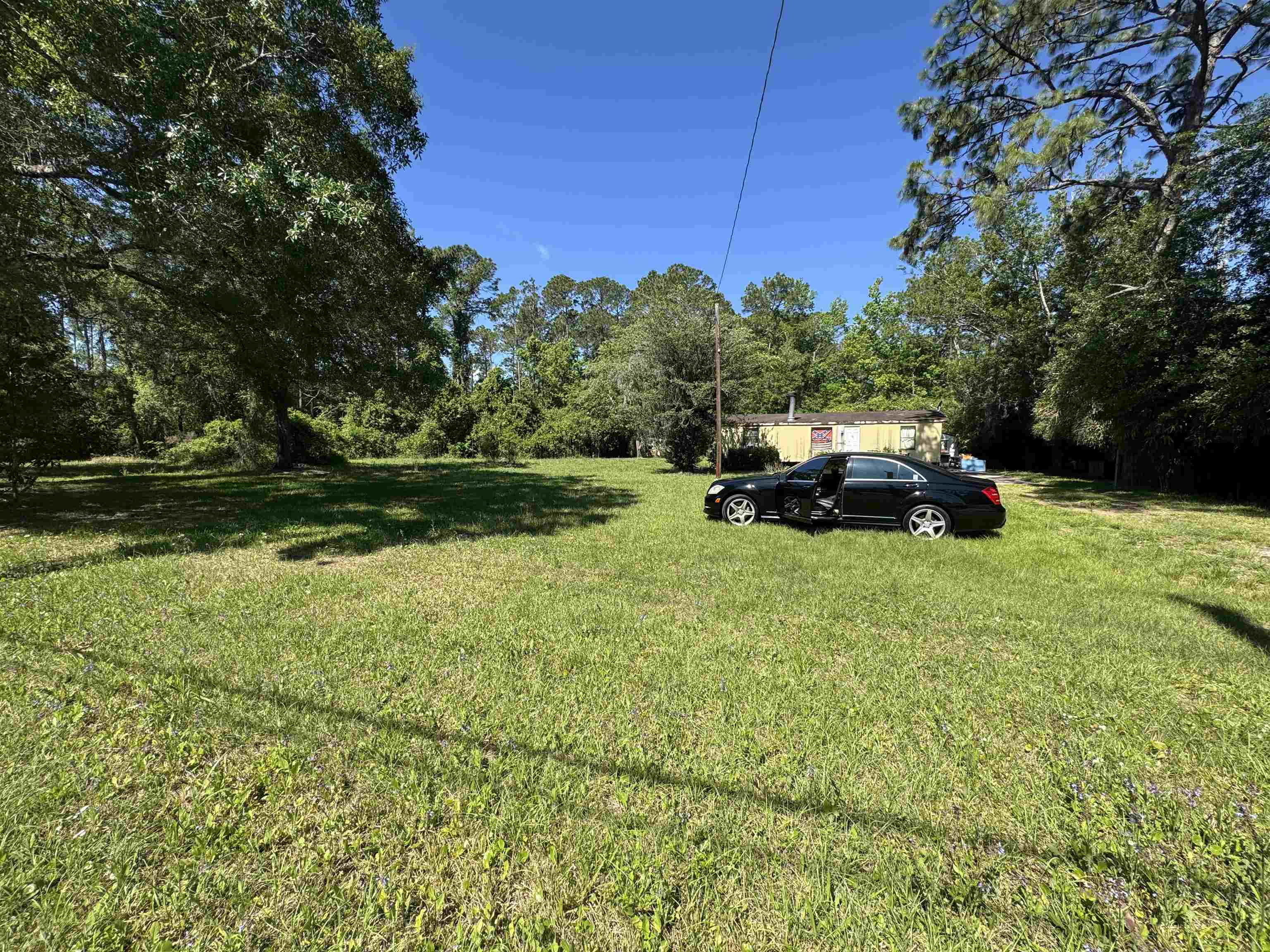 2981 Pacetti Road St. Augustine, FL 32092 - Photo 5 of 6 a car parked in front of a house