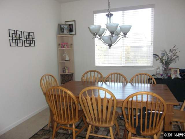 14044 Tagor Road Reno, NV 89521 - Photo 4 of 12 a view of a dining room with furniture and window