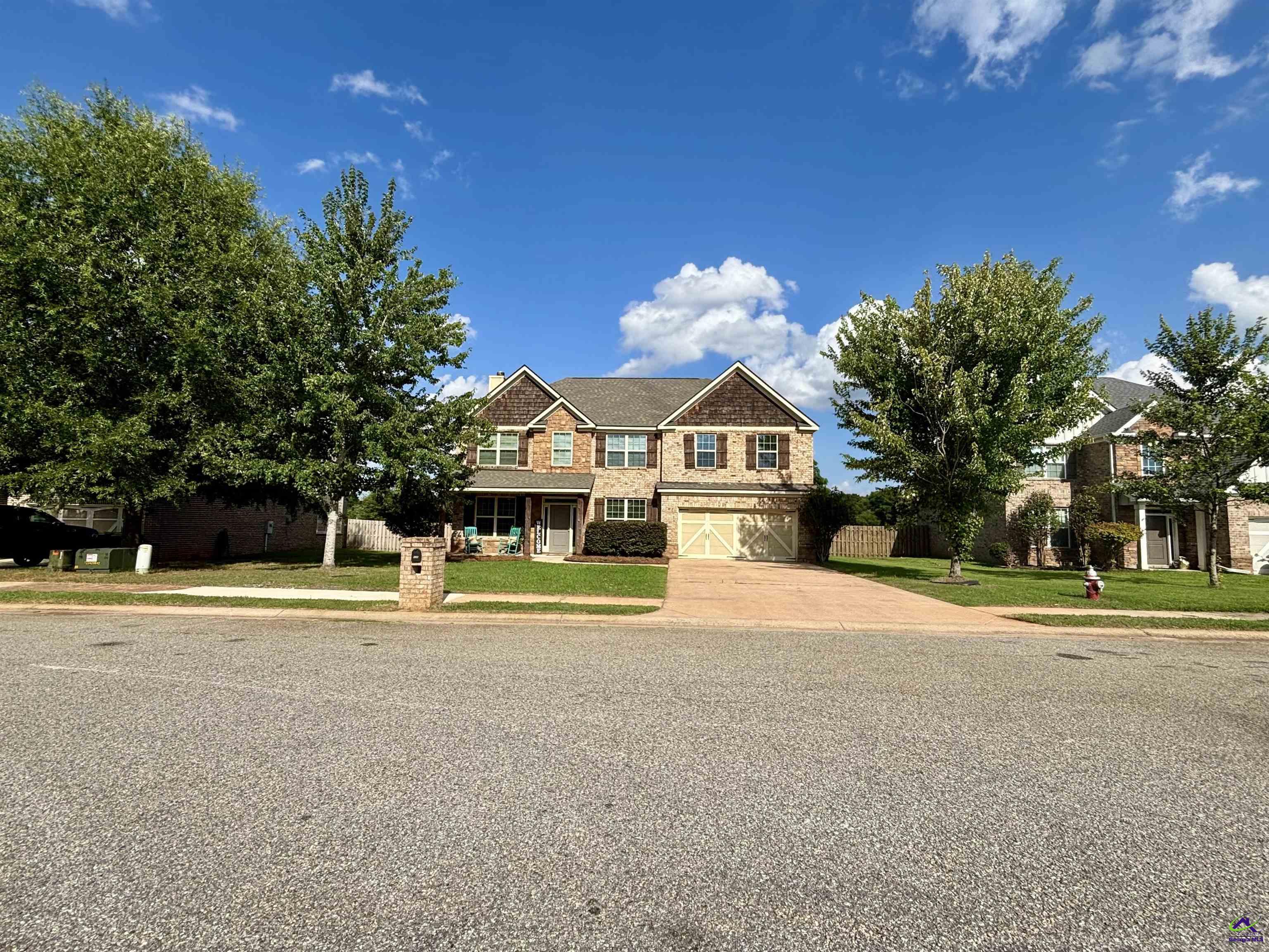 600 Post Oak Way Warner Robins, GA 31088 - Photo 4 of 50 a front view of house with yard and green space