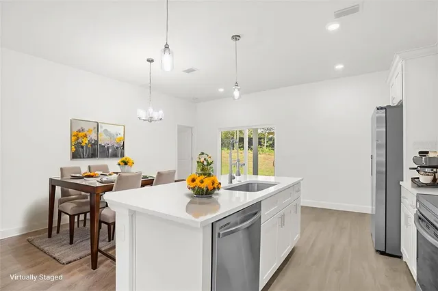 an empty room with wooden floor