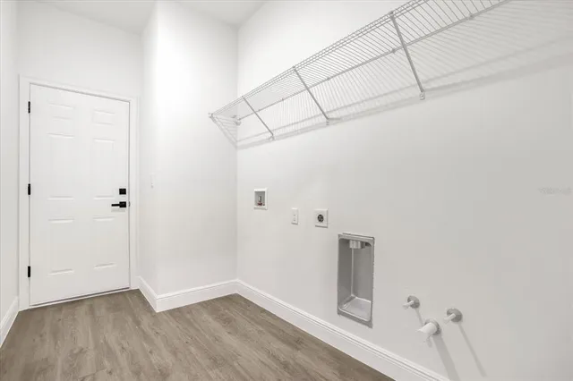 a view of small space with wooden floor