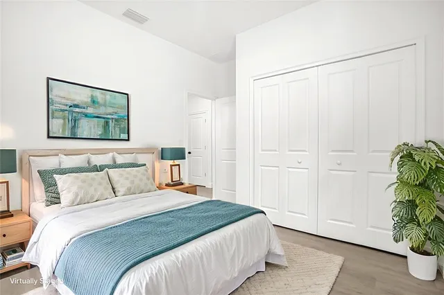 a view of a house with a yard and a garden