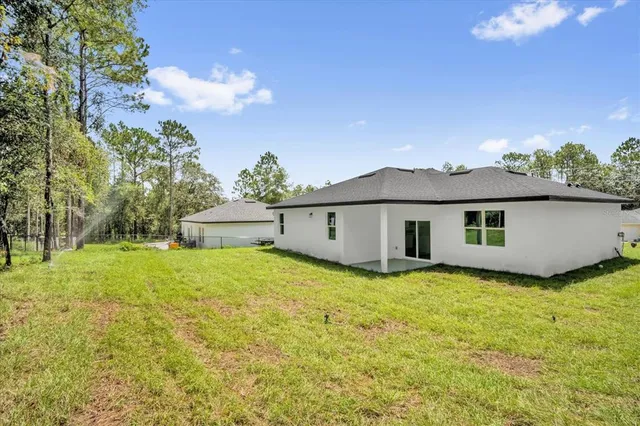 a view of a swimming pool with an outdoor space