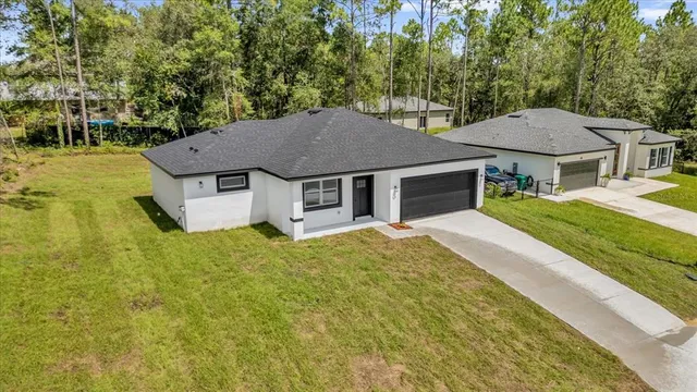 a house view with a garden space